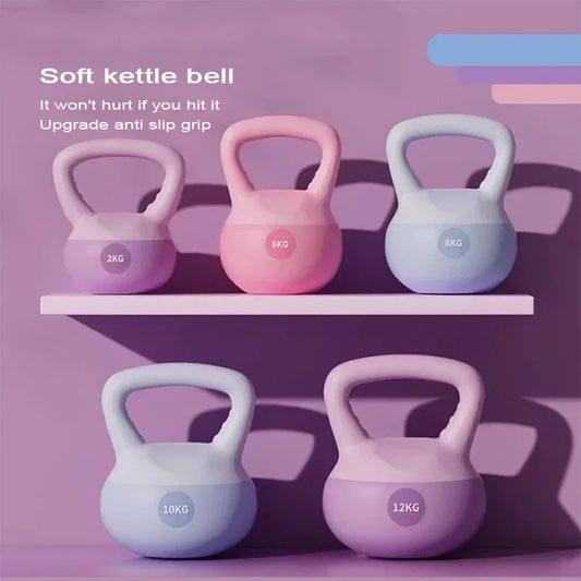 Soft kettlebells, women carrying kettlebells, deep squat strength training, soft bottomed kettlebells